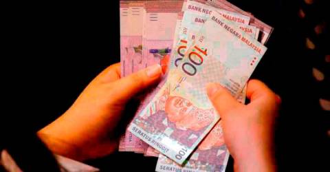 Ringgit opens marginally higher vs US dollar, traders await Budget 2025