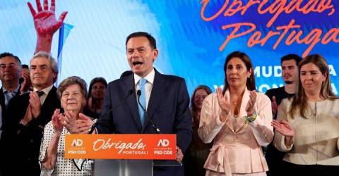 Portuguese PMs party claims election win, falls short of majority