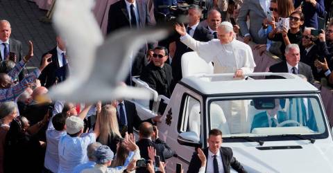 First US pope Leo XIV takes to popemobile ahead of inaugural mass