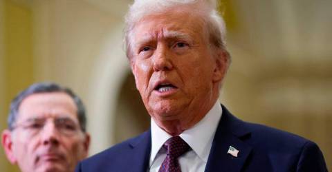 Trump says arranging a meeting with Putin