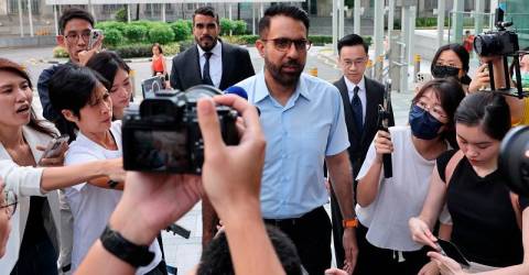 Singapore court finds opposition party leader guilty of lying to parliament 