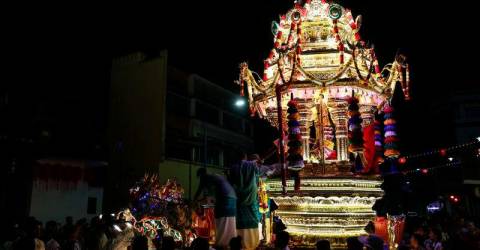 Thousands of devotees procession with gold, silver chariots