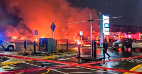 Small plane crashes in Philadelphia, sparking fire on the ground