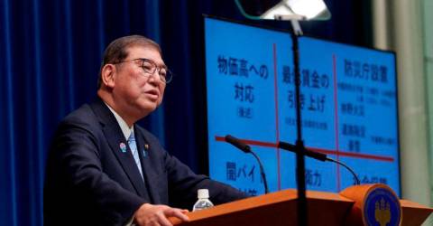 Japan PM vows to support businesses hit by US tariffs