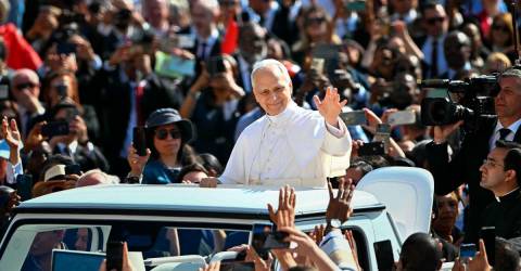 With first ride in a popemobile, Leo starts big inaugural ceremony before tens of thousands