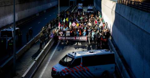 Dutch police detain hundreds at climate protest
