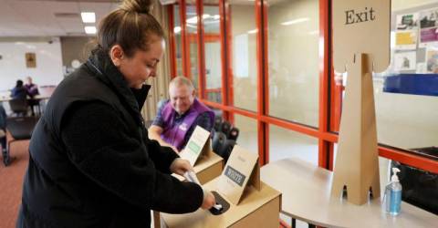 Australians vote in election swayed by inflation, Trump