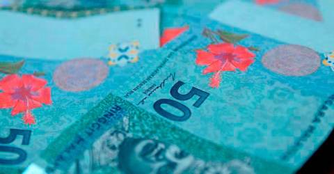 Ringgit opens slightly higher against US Dollar