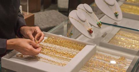 Gold slightly recovers from over one-week low