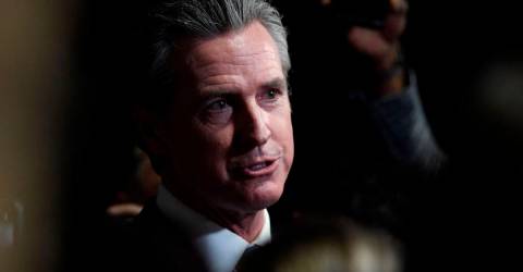 Newsom floats cutting free healthcare for some migrants in California