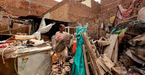 At least 14 killed in Pakistan storms after heatwave