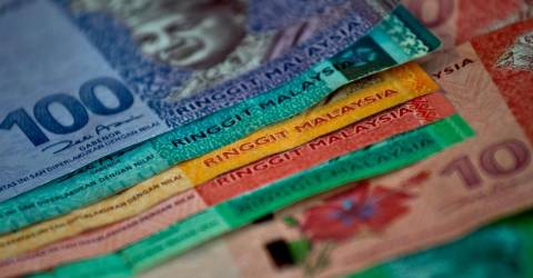 Ringgit opens higher against US dollar amid robust US bond auction