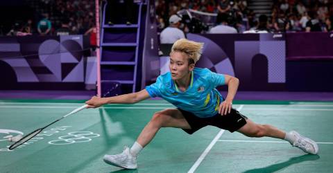Jin Wei crashes out of Malaysian Open after stomach cramp setback