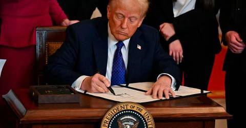 Trump signs orders on hot-button social issues in schools