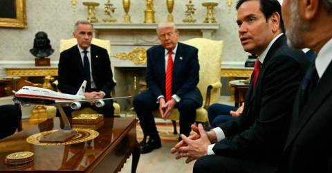 Trump talks tough on China, but early focus elsewhere