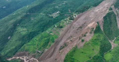 At least two killed as landslides trap 19 in southwest China: state media