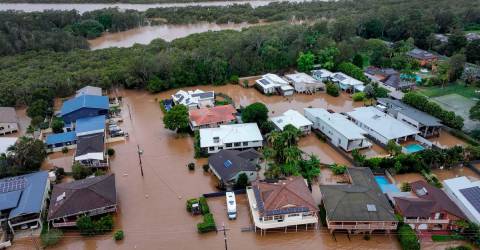 Torrential rain ravages Australian towns, thousands brace for isolation 