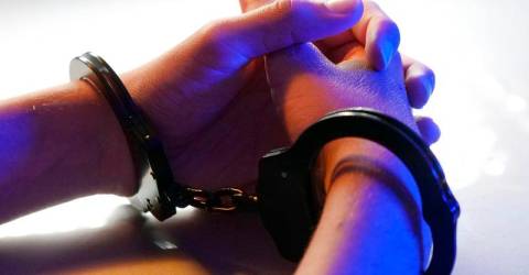 UK police release 14 children held after boy dies in fire