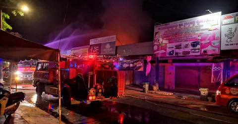 Disabled son of owner dies in motorcycle shop fire