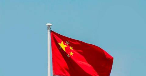 China says ‘firmly opposes’ trade deals that harm its interests