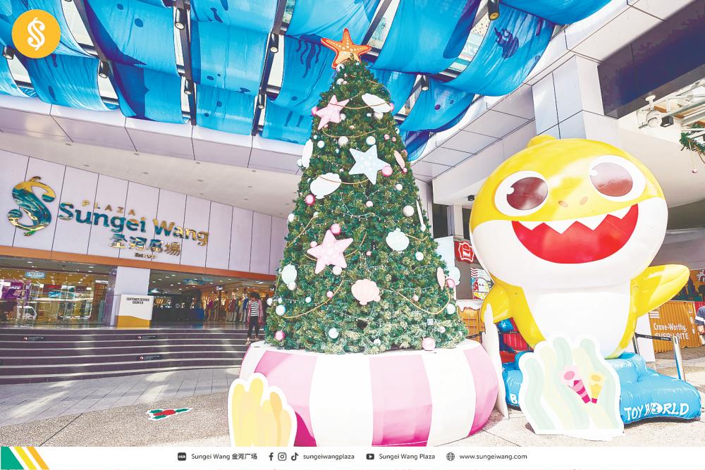 Shoppers are greeted by inflatable figures of Baby Shark at the main entrance of Sungei Wang Plaza.