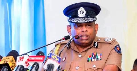 Sri Lanka hunts for police chief over deadly raid