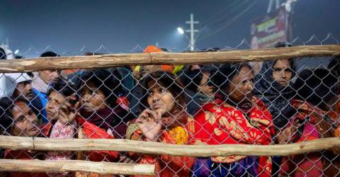 Millions of Hindus take ‘holy dip’ a day after fatal stampede