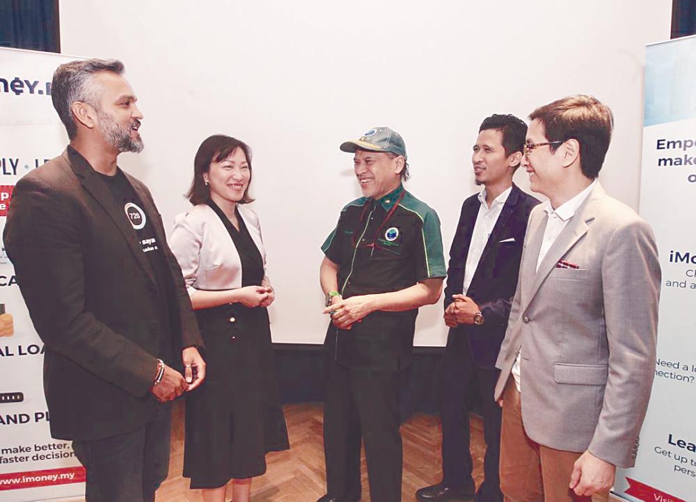 From left: Mitul, Lai, Muslim Consumer Association of Malaysia chief activist Datuk Nadzim Johan, My Two Cents editor and Personal Finance adviser Kauthar Rozmal and Main Street Capital CEO Julian Ng.