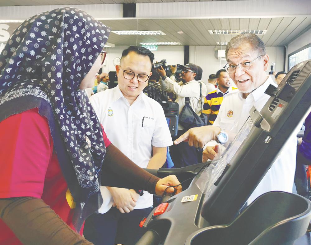 Dzulkefly (right) at the launch of the wellness hub in North Seberang Perai on Saturday. – T.C. KHOR/THESUN