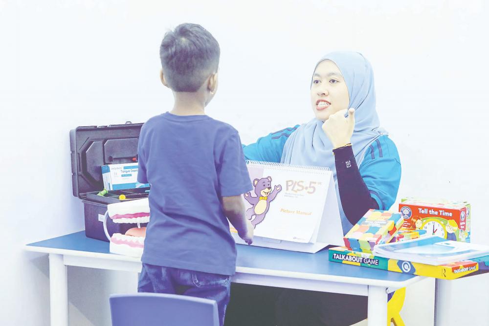 Hee said research shows children who receive appropriate intervention before their first birthday achieve the best results in language, cognition and social skills. – ADIB RAWI YAHYA/THESUN