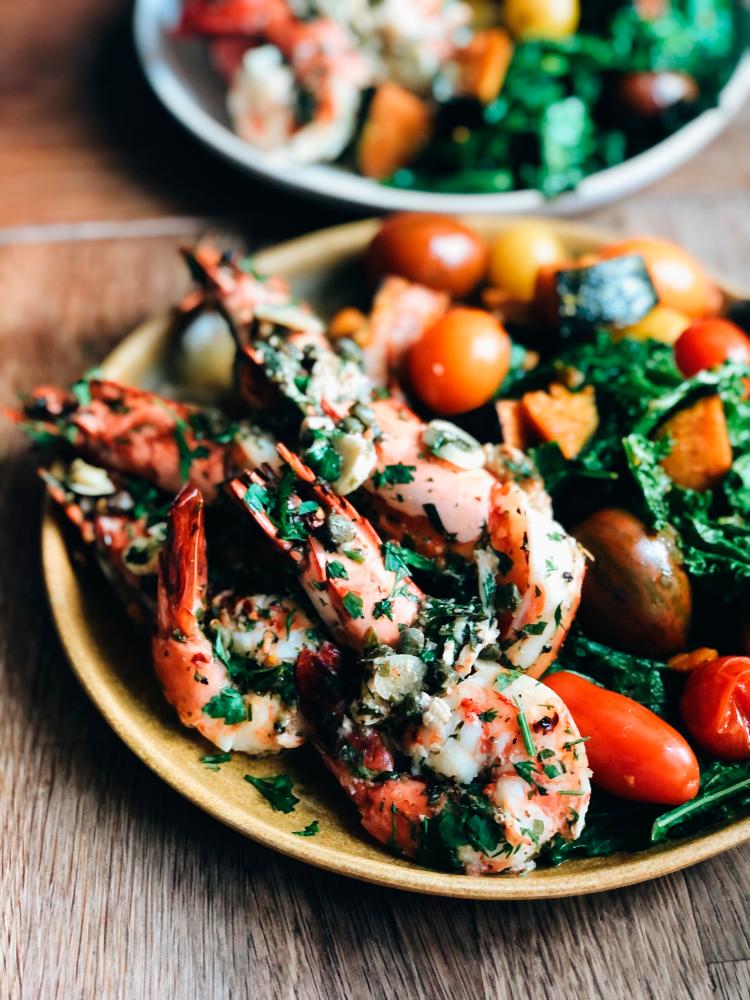 $!Grilled king prawns with roasted vegetables. – PICTURE COURTESY OF DINESH RAO