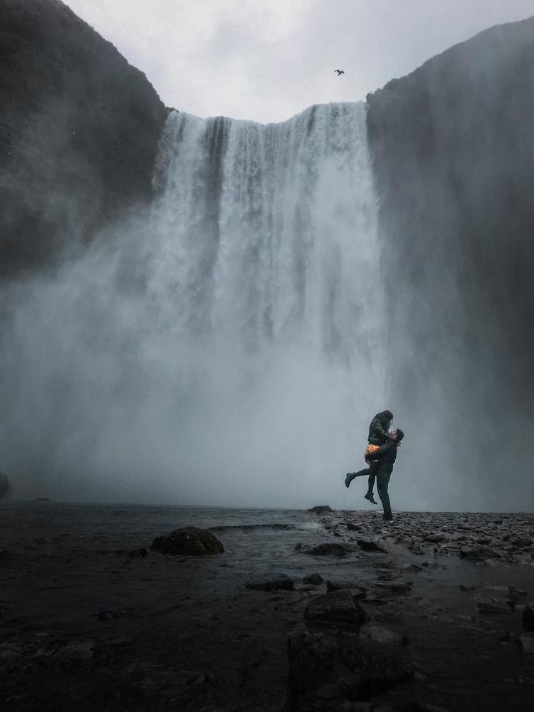 $!A touching picture of a couple against a waterfall in Iceland.
