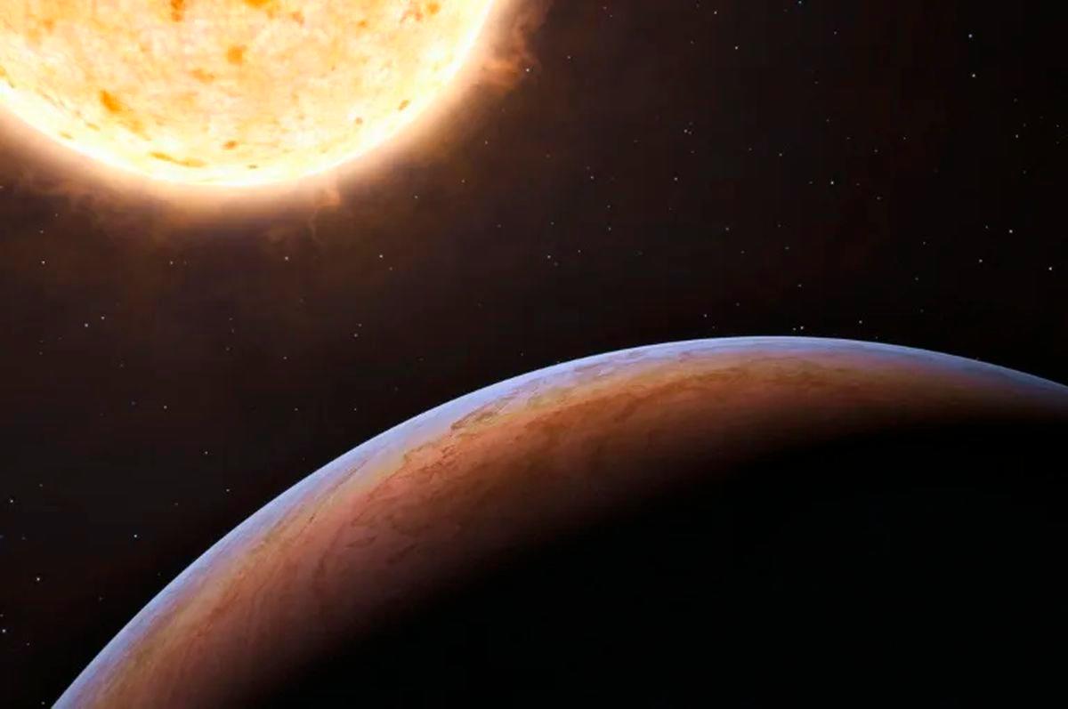 An artist’s illustration of an exoplanet and its star (HO) (HO/ESO/AFP)