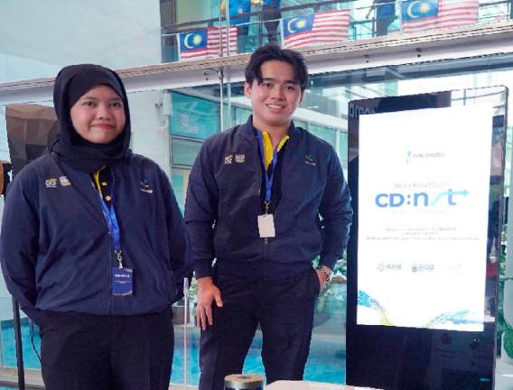 Nurdini Inara Zulfiqri (left) and Par Jun Qi during the launch of the CD:NXT programme