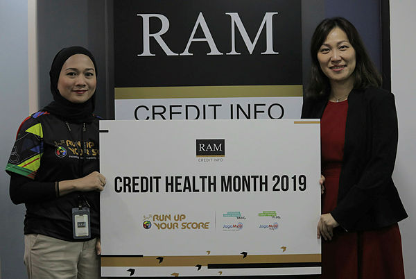 Lai ( right) and senior manager and head of consumer direct Zuraidah Ahmad launching the “Credit Health Month 2019” today.
