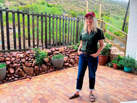 Katia Beeden, life coach and campaigner for white South Africans who want to apply for US refugee status, poses for a picture at her residence in Fish Hoek, Cape Town, South Africa, April 8, 2025. REUTERS/Shafiek Tassiem/File Photo