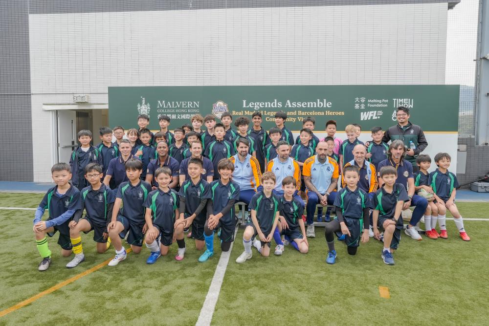 Legends unite L-R: Javier Saviola, Patrick Kluivert, Gaizka Mendieta, Ruben de la Red Gutierrez, Antonia Nunez Tena, Pedro Munitis Alvarez, Jose Emilio Amavisca Garate, and Raul Bravo Sanfelix, alongside Malvern College Hong Kong pupils.