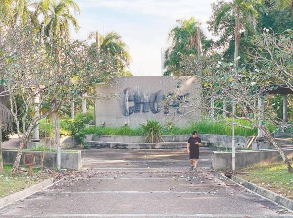 Broken plaques and monuments, overgrown weeds, overflowing rubbish and structures defaced with graffiti greet visitors to once iconic site. - ADIB RAWI YAHYA / THESUN