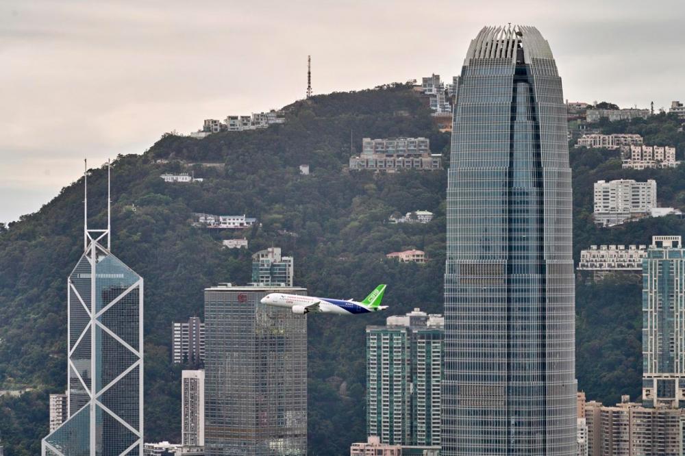 $!A C919 flight demonstration over Hong Kong on December 16, 2023.