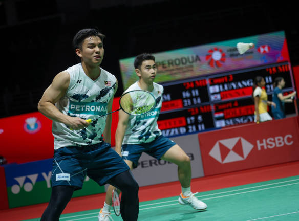 Malaysian men’s doubles shuttlers Goh Sze Fei (right) and Nur Izzuddin Rumsani.
