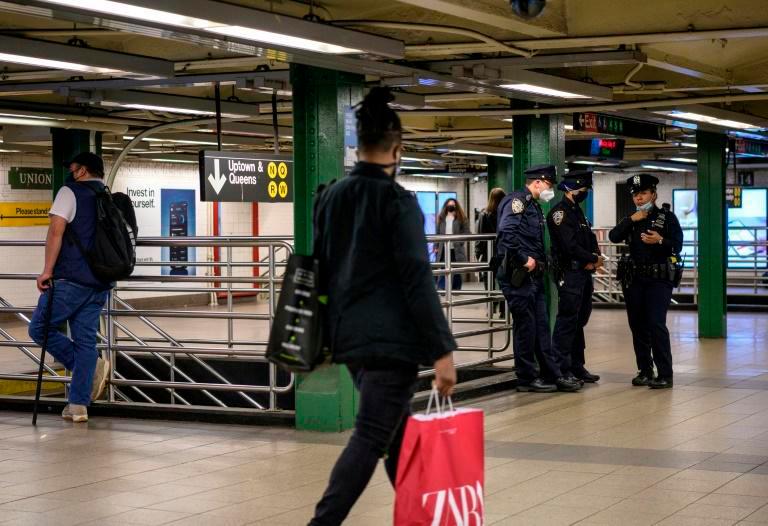 Police officers patrol New York’s Union Square subway station on May 10, 2021. — AFP