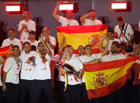 Spain’s Dani Olmo, Alvaro Morata and teammates celebrate on Plaza Cibeles after winning Euro 2024/REUTERSpix