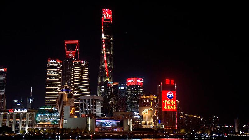 $!Shanghai Tower lights up in red in the evening on January 28, 2025.