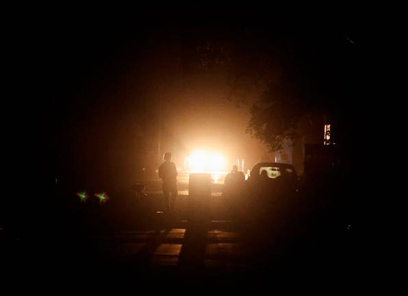 A man walks on a street during a blackout in the city of Amritsar, India, May 10, 2025 REUTERS/Francis Mascarenhas