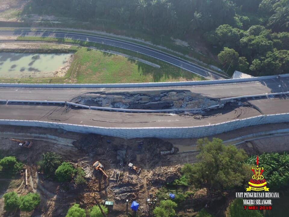 A damaged part of the West Coast Expressway. — Pix via social media