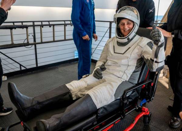 NASA astronaut Suni Williams is helped out of a SpaceX Dragon spacecraft onboard the SpaceX recovery ship MEGAN after she, NASA astronaut Nick Hague, and Butch Wilmore, and Roscosmos cosmonaut Aleksandr Gorbunov landed in the water off the coast of Tallahassee, Florida.REUTERSpix