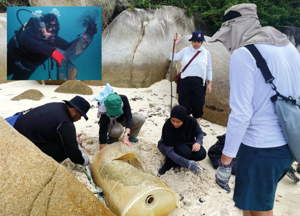 Volunteers removing a plastic drum from the beach and (inset) a diver retrieving rubbish from the seabed. - Credit: Yayasan Sime Darby