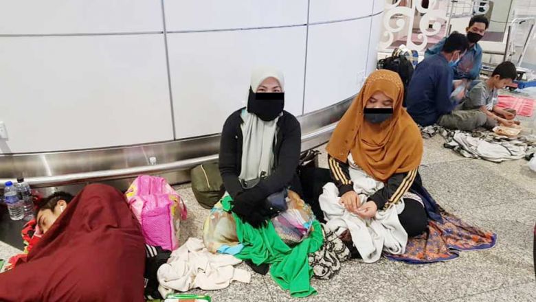 Cambodian migrant workers at KLIA after their flights were cancelled. — The Phnom Penh Post photo
