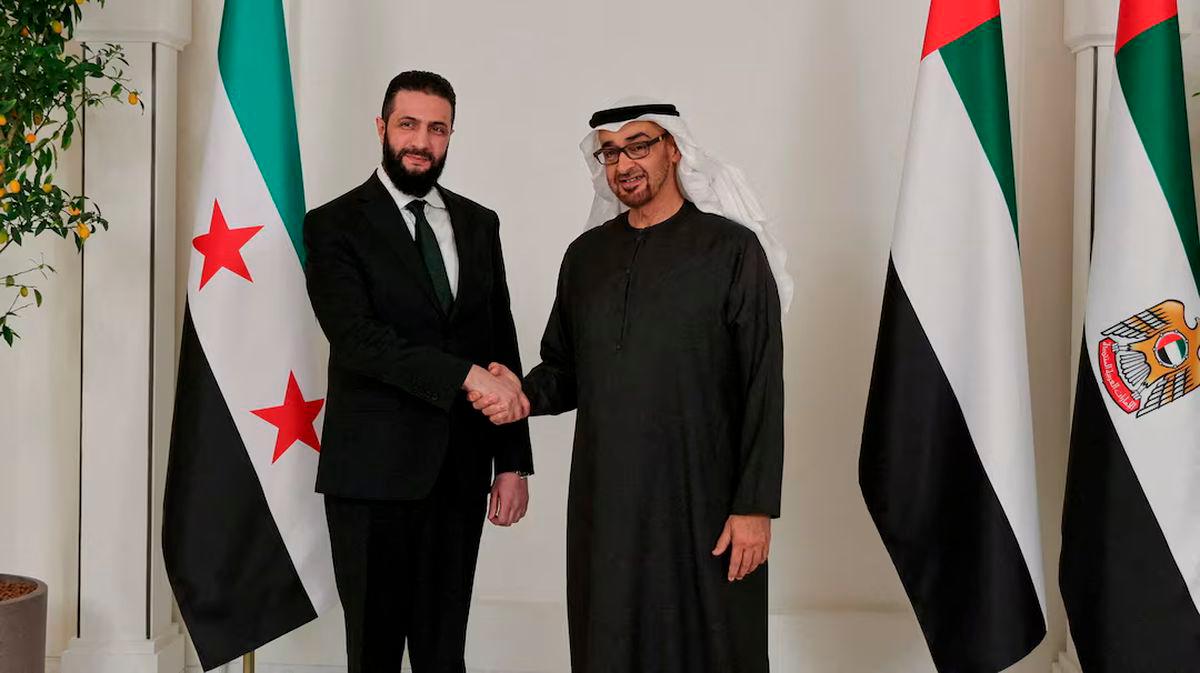 Syrian President Ahmed al-Sharaa shakes hands with UAE’s President Sheikh Mohamed bin Zayed Al Nahyan, in Abu Dhabi - REUTERSpix