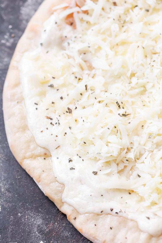 $!This white pizza skips the tomato sauce for a creamy taste.– PINTERESTPIC